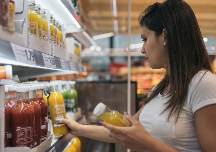 Woman looking at beverages