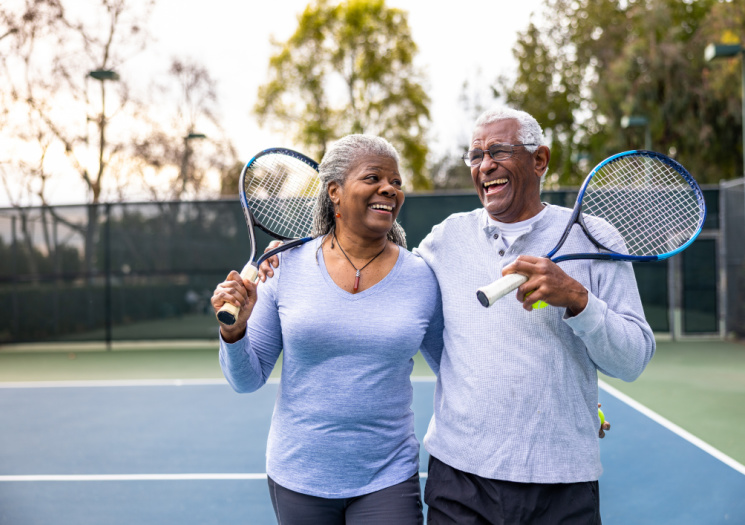 Middle-aged couple exercising