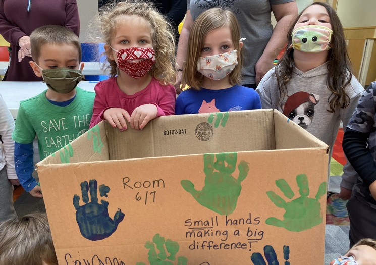 Students building recycling box