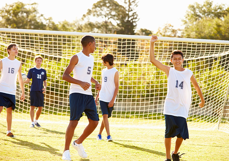 Kids playing soccer